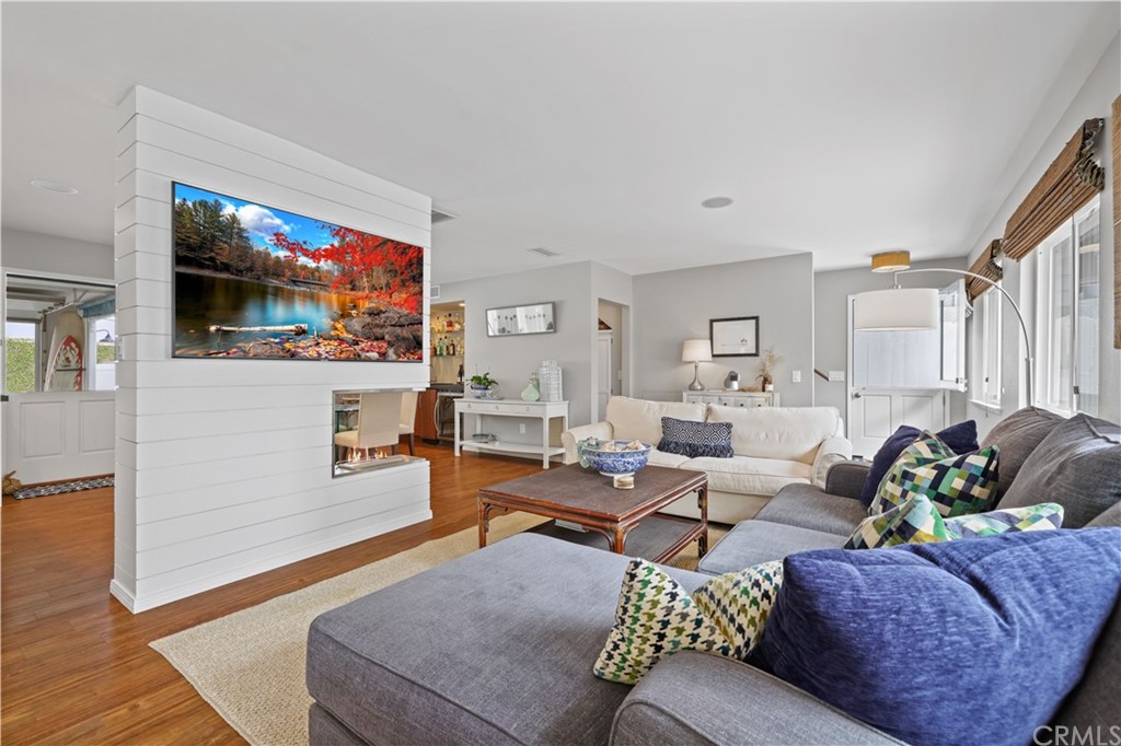 C-29 Surfside Avenue Surfside, CA 90743 - Photo 7 of 36 a living room with furniture and a flat screen tv