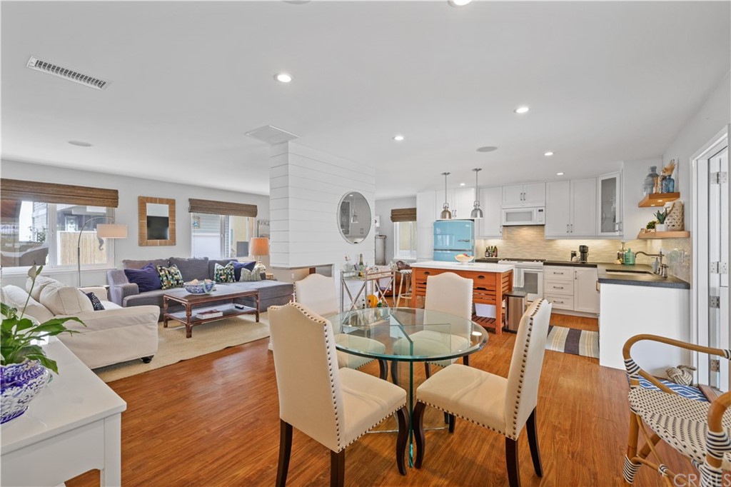 C-29 Surfside Avenue Surfside, CA 90743 - Photo 10 of 36 a living room with lots of furniture and kitchen view