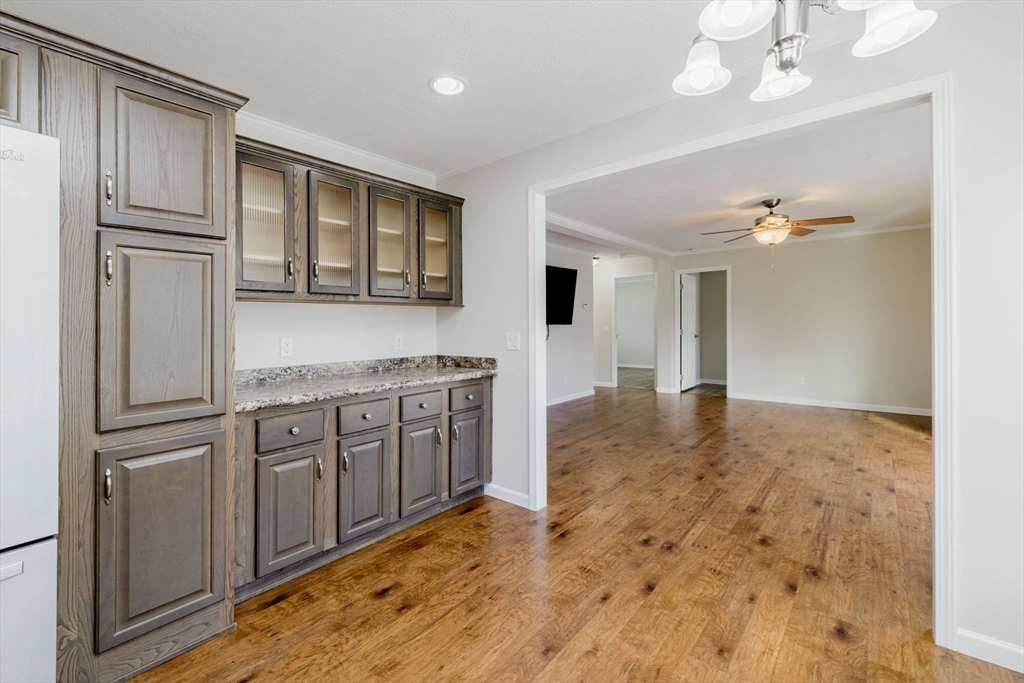 17 Maries Way Raynham, MA 02767 - Photo 11 of 39 a kitchen with stainless steel appliances granite countertop a refrigerator and a sink