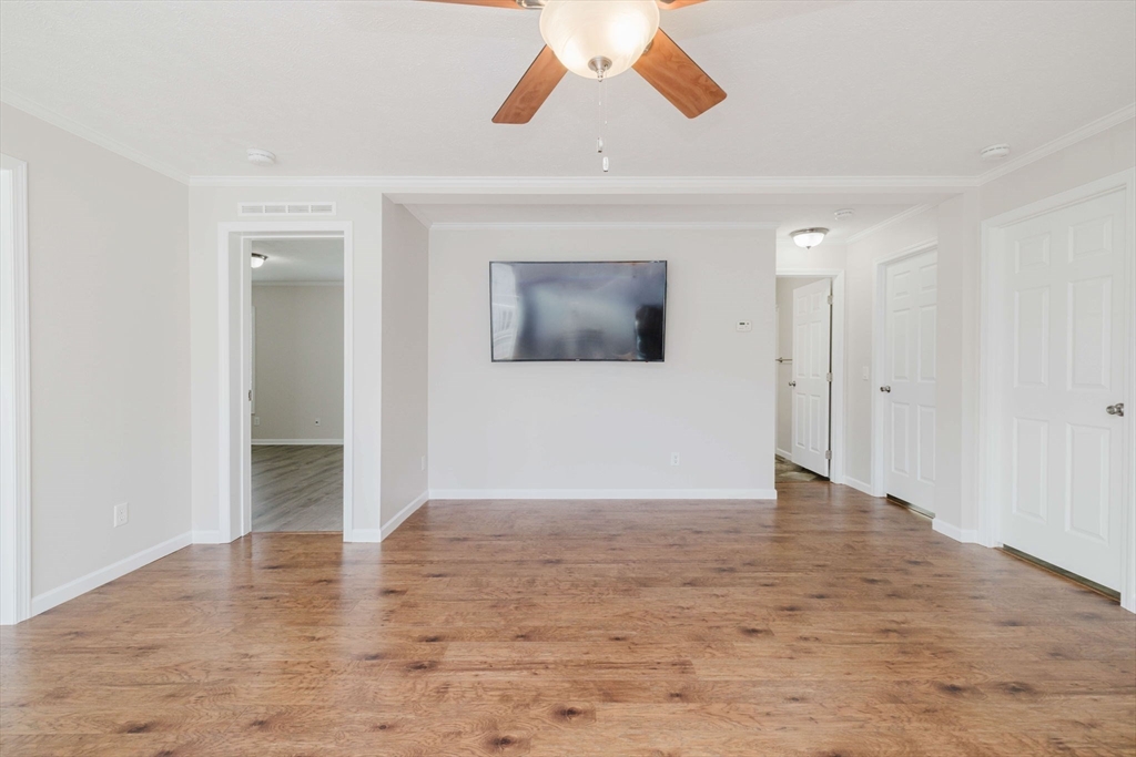 17 Maries Way Raynham, MA 02767 - Photo 19 of 39 wooden floor in an empty room
