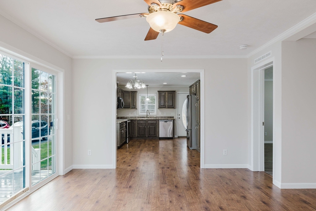 17 Maries Way Raynham, MA 02767 - Photo 20 of 39 a view of a kitchen with a sink and wooden floor
