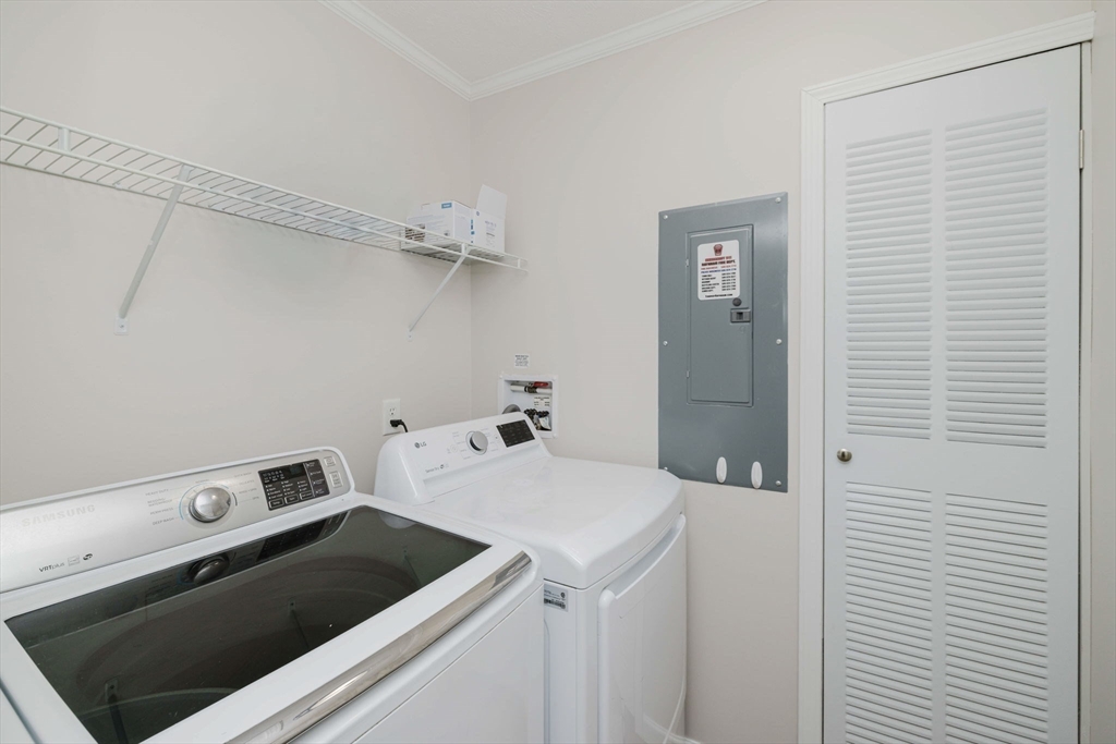 17 Maries Way Raynham, MA 02767 - Photo 31 of 39 a utility room with dryer and washer