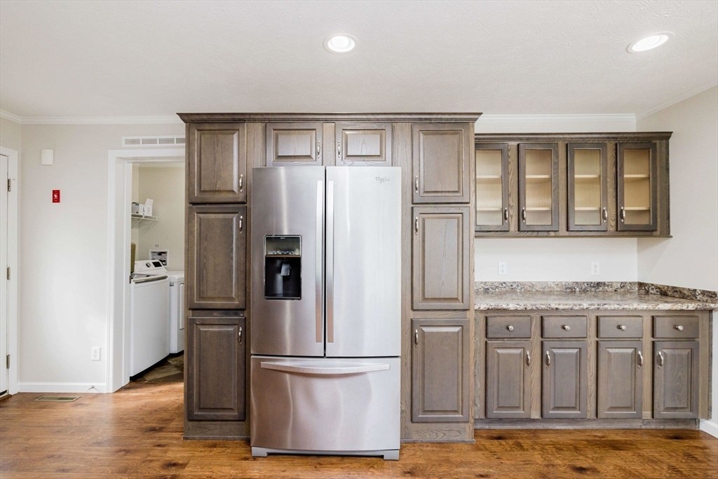 17 Maries Way Raynham, MA 02767 - Photo 9 of 39 a kitchen with stainless steel appliances granite countertop a refrigerator and a stove
