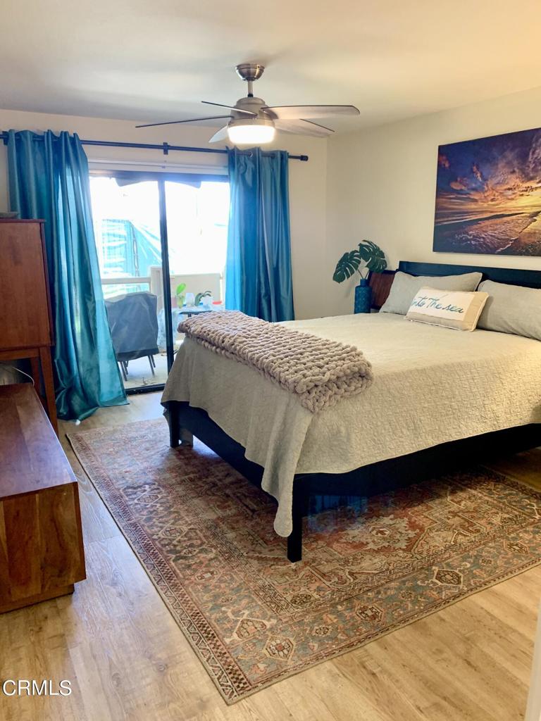 754 Island View Circle Port Hueneme, CA 93041 - Photo 23 of 67 a bed sitting in a bedroom next to a window