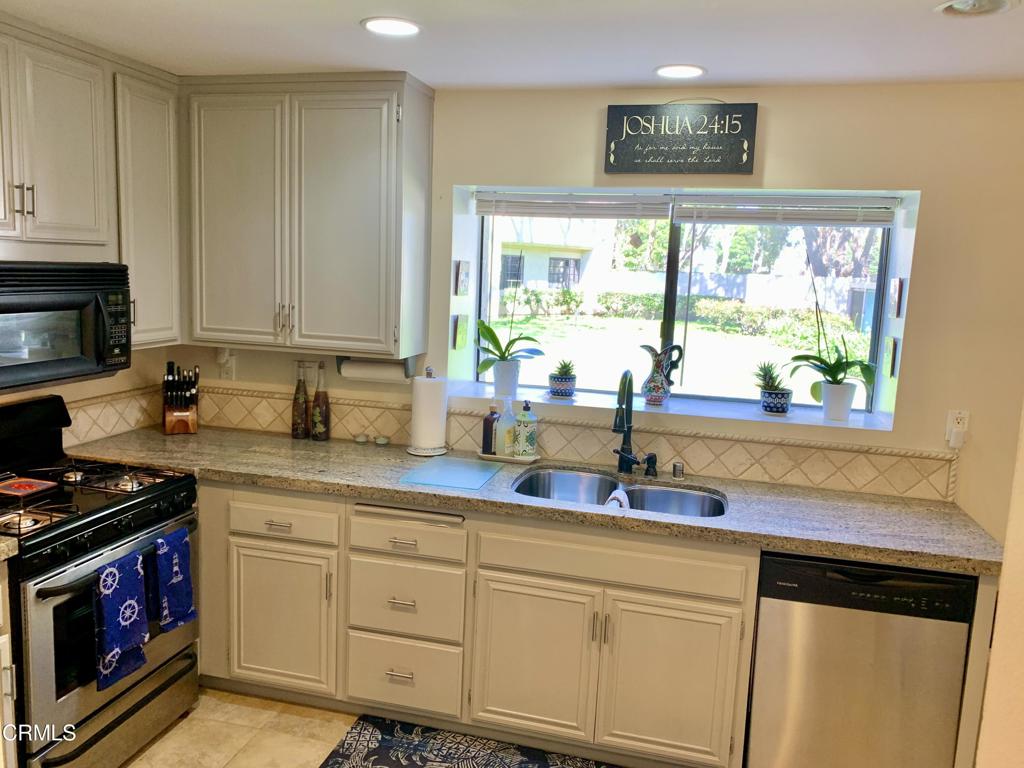 754 Island View Circle Port Hueneme, CA 93041 - Photo 3 of 67 a kitchen with stainless steel appliances white cabinets and a window