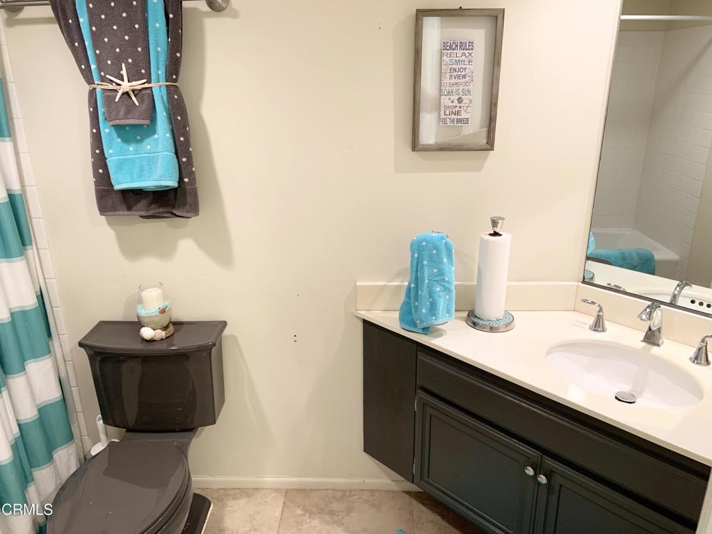 754 Island View Circle Port Hueneme, CA 93041 - Photo 38 of 67 a bathroom with a sink and a mirror