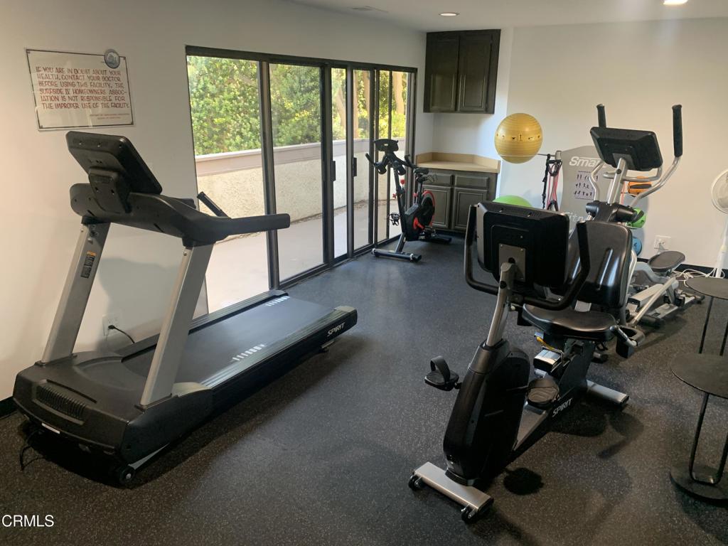 754 Island View Circle Port Hueneme, CA 93041 - Photo 60 of 67 a room with gym equipment and a large window