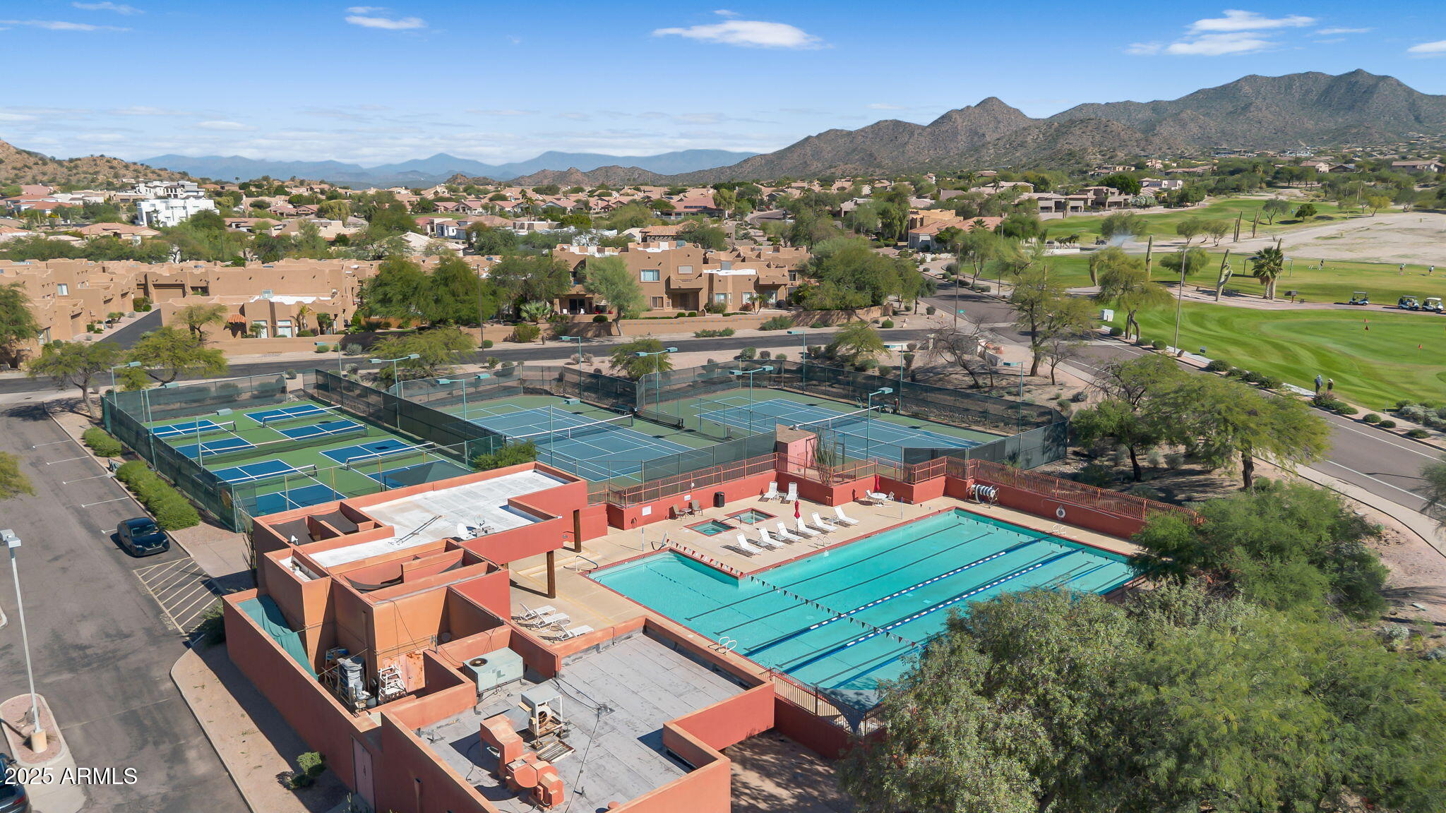 4055 North Recker Road, Unit 18 Mesa, AZ 85215 - Photo 45 of 63 an aerial view of residential houses with outdoor space and river