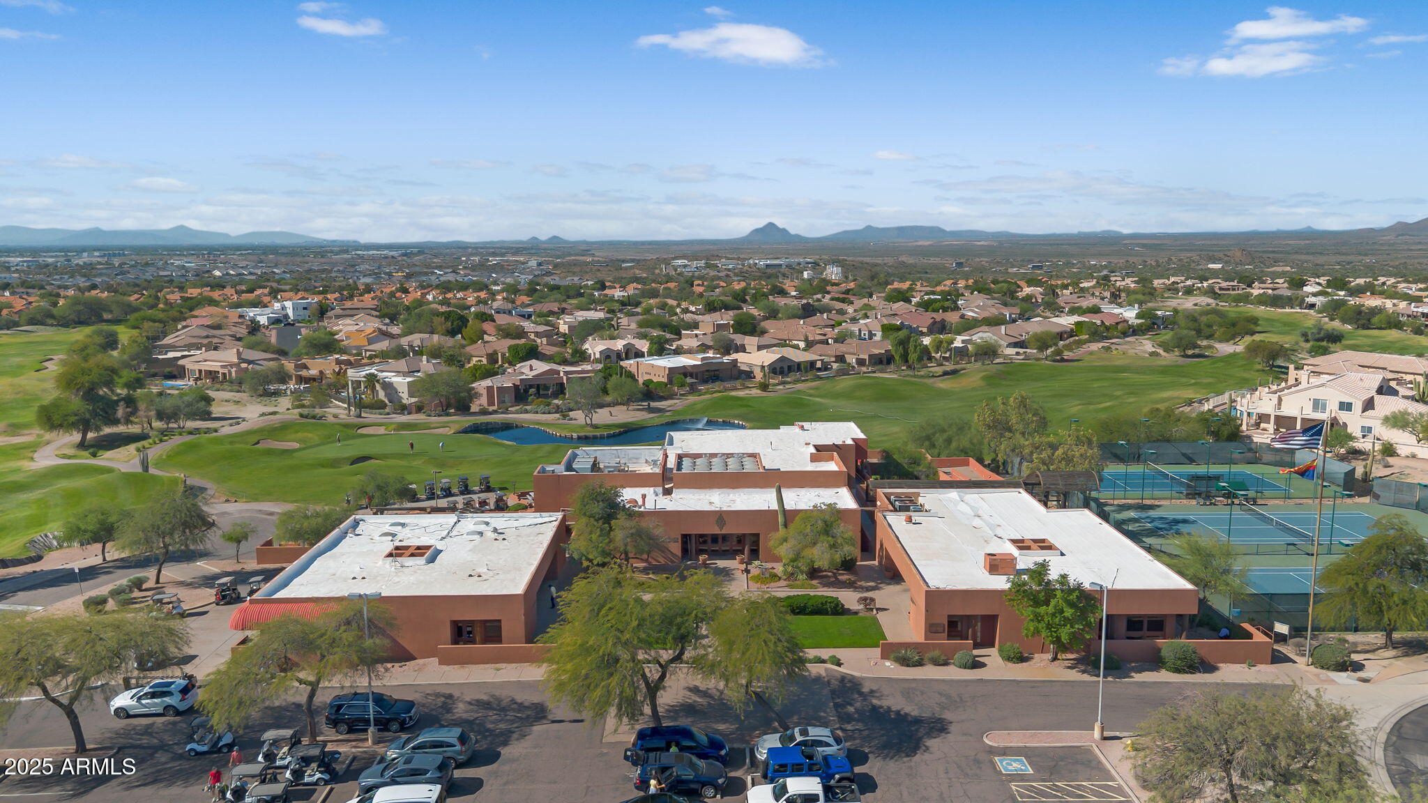 4055 North Recker Road, Unit 18 Mesa, AZ 85215 - Photo 52 of 63 an aerial view of a houses with outdoor space