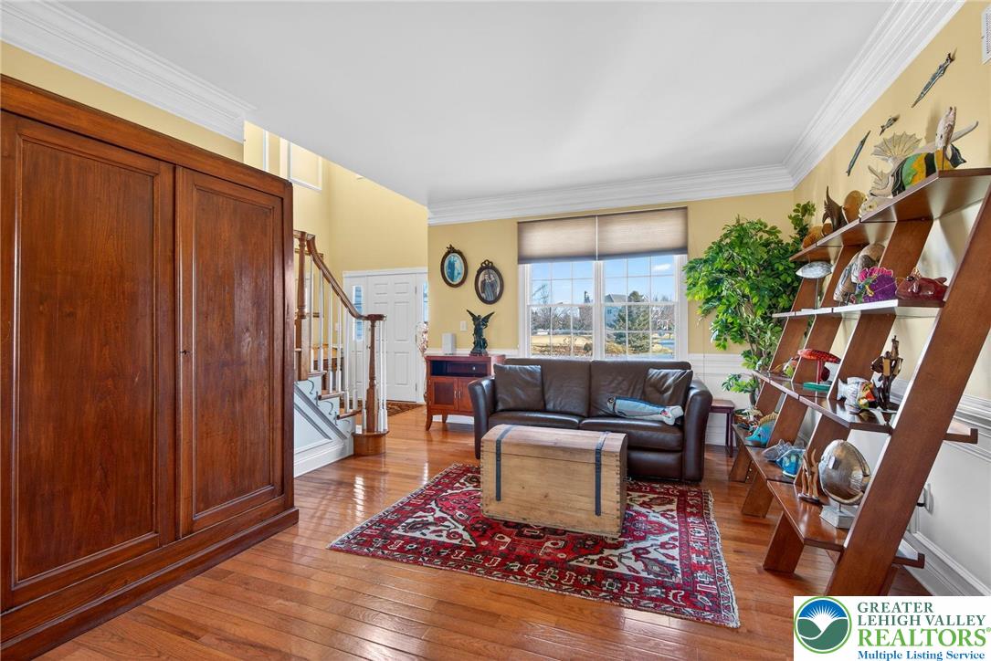 591 Rockbridge Road Nazareth, PA 18064 - Photo 17 of 73 a living room with fireplace furniture and a large window