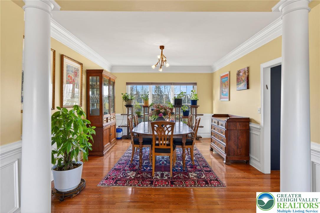 591 Rockbridge Road Nazareth, PA 18064 - Photo 18 of 73 a living room with furniture large window and potted plants