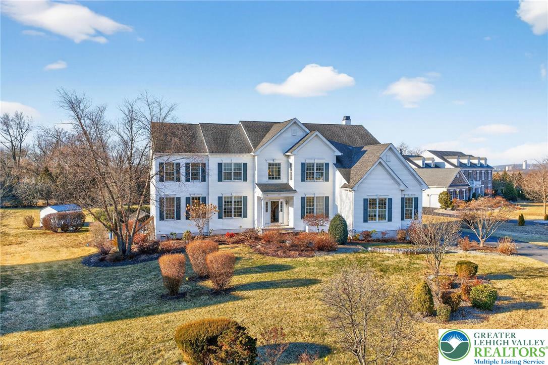 591 Rockbridge Road Nazareth, PA 18064 - Photo 2 of 73 a front view of a house with swimming pool and a yard