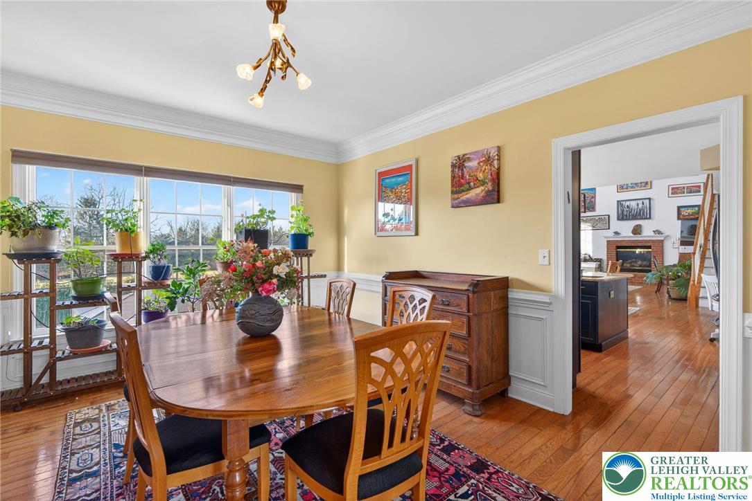 591 Rockbridge Road Nazareth, PA 18064 - Photo 21 of 73 a view of a dining room with furniture window and wooden floor