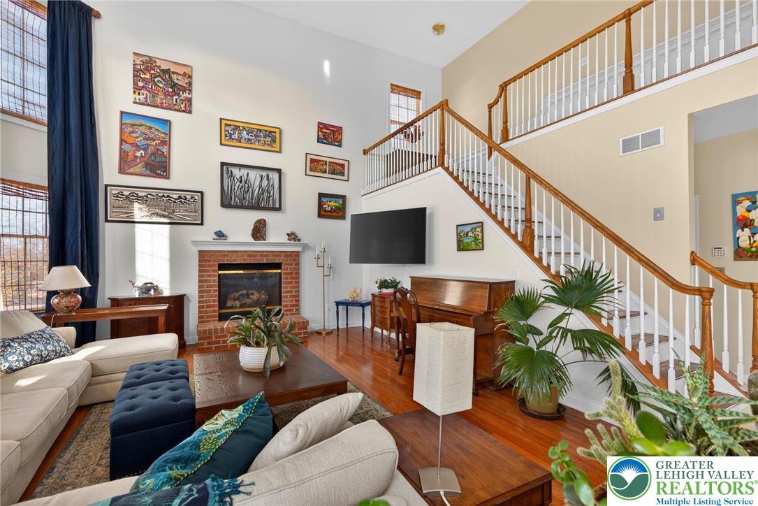 591 Rockbridge Road Nazareth, PA 18064 - Photo 25 of 73 a living room with furniture flower pot and a fireplace