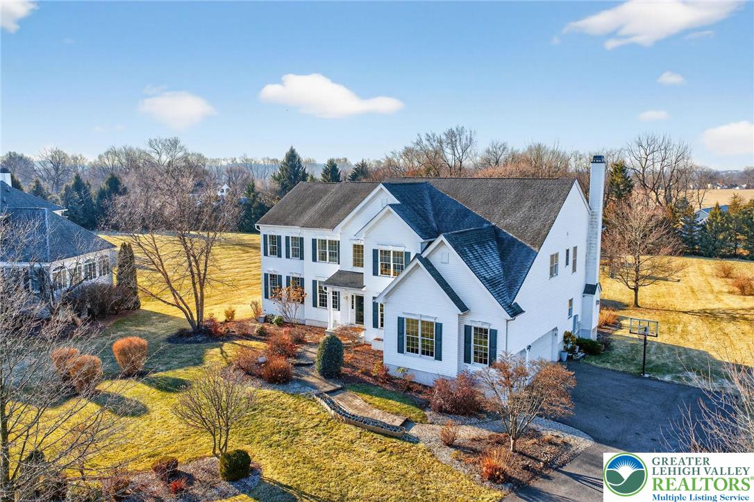591 Rockbridge Road Nazareth, PA 18064 - Photo 3 of 73 a aerial view of a house with swimming pool lawn chairs and a yard