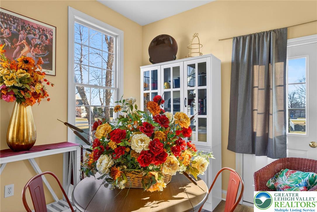 591 Rockbridge Road Nazareth, PA 18064 - Photo 32 of 73 a living room filled with furniture and a floor to ceiling window