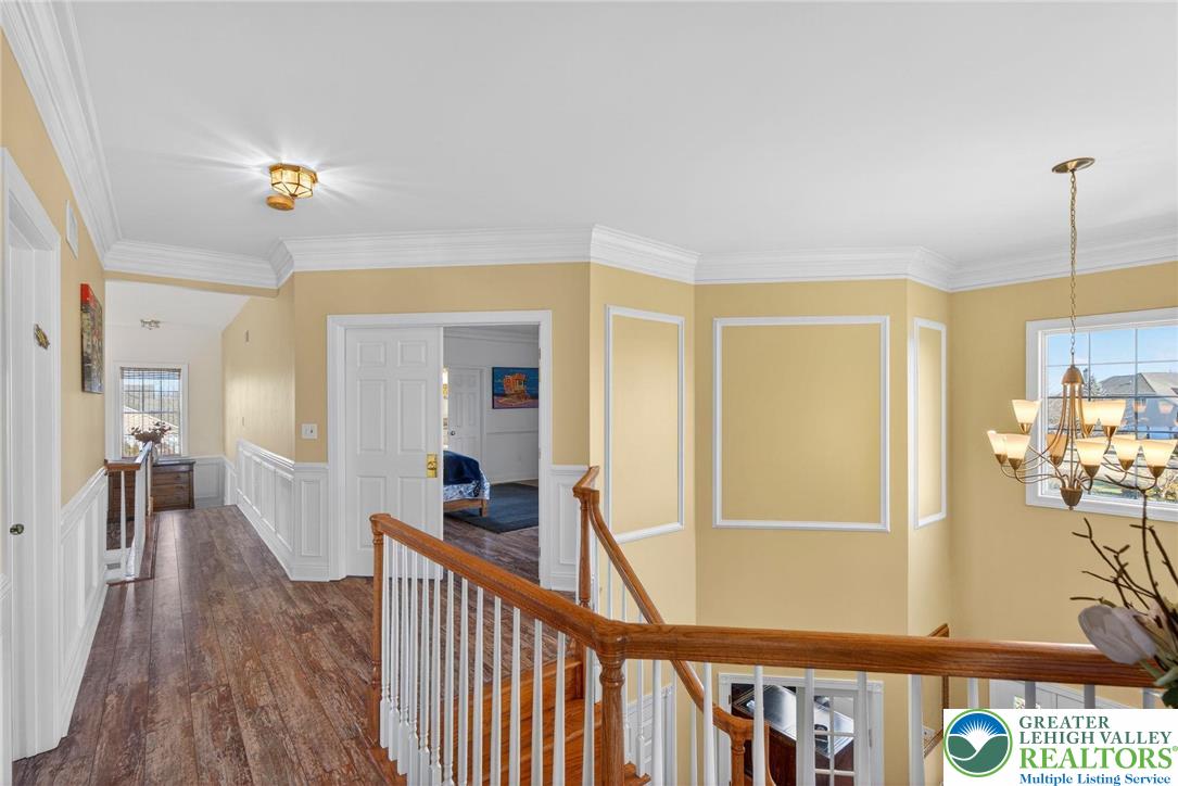 591 Rockbridge Road Nazareth, PA 18064 - Photo 37 of 73 a view of a hallway view with living room and wooden floor