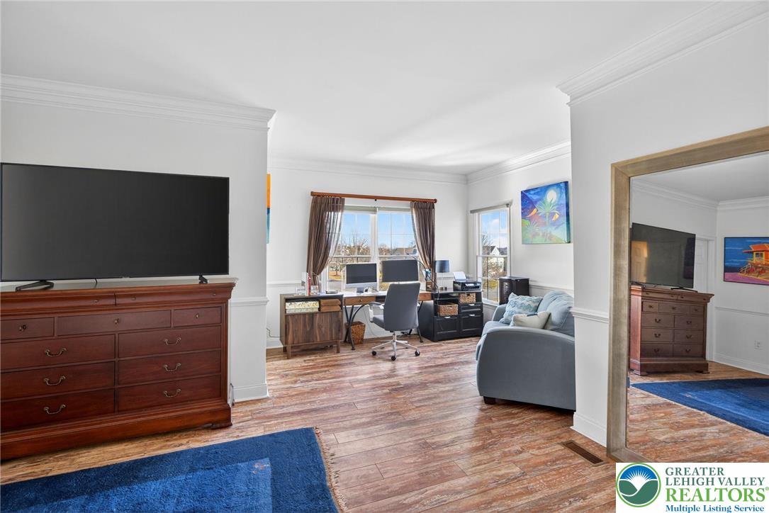 591 Rockbridge Road Nazareth, PA 18064 - Photo 42 of 73 a living room with furniture and a flat screen tv