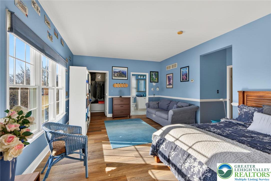 591 Rockbridge Road Nazareth, PA 18064 - Photo 48 of 73 a bedroom with a large bed and a couch