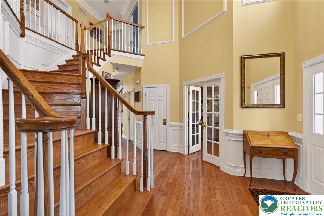 591 Rockbridge Road Nazareth, PA 18064 - Photo 5 of 73 a view of entryway and hall with wooden floor