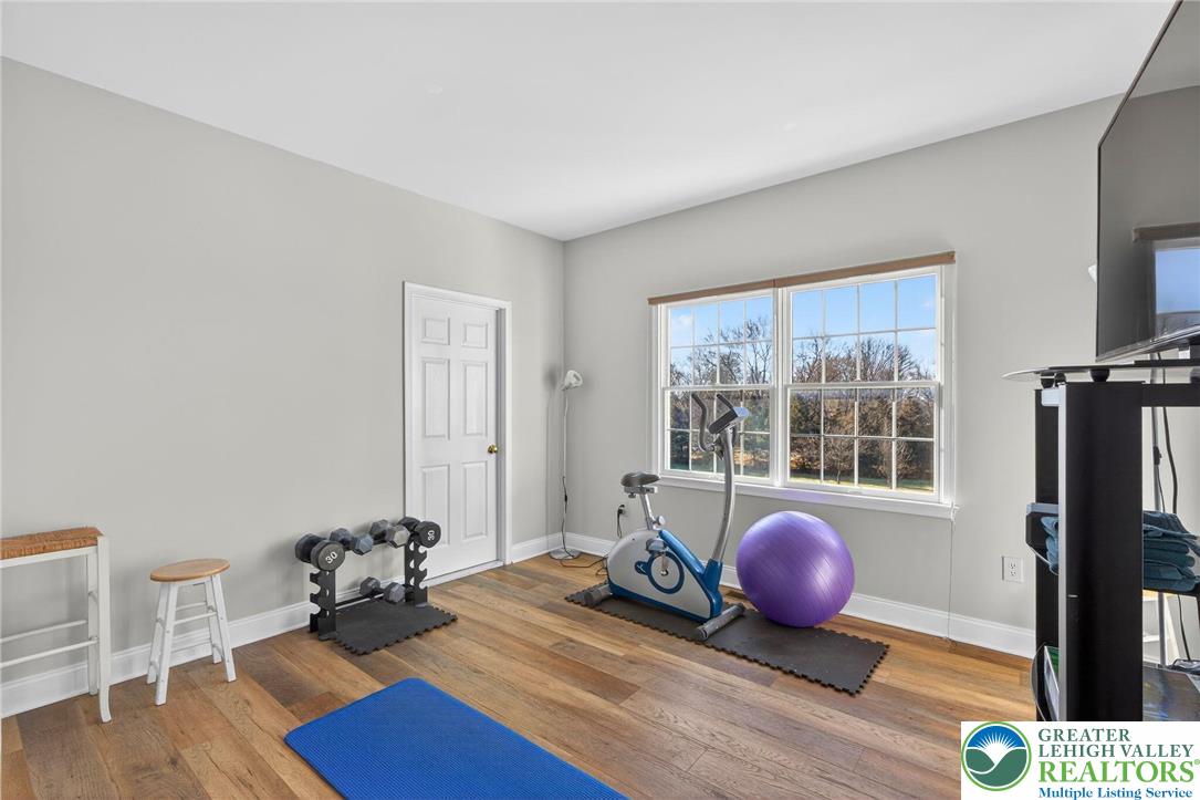 591 Rockbridge Road Nazareth, PA 18064 - Photo 55 of 73 a living room with furniture and wooden floor
