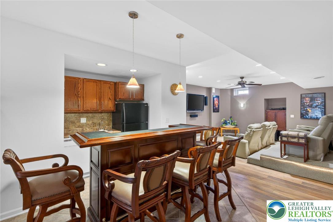 591 Rockbridge Road Nazareth, PA 18064 - Photo 58 of 73 a view of a dining room with furniture window and wooden floor