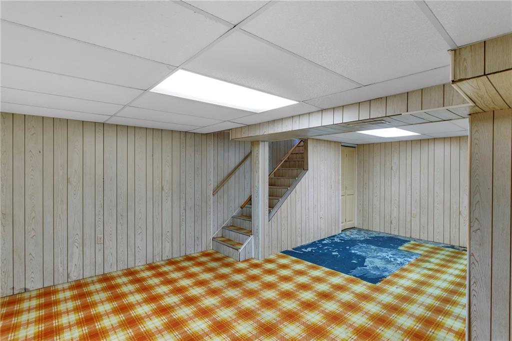 617 Blueberry Road Monroeville, PA 15146 - Photo 20 of 38 a view of a big room with closet and wooden floor