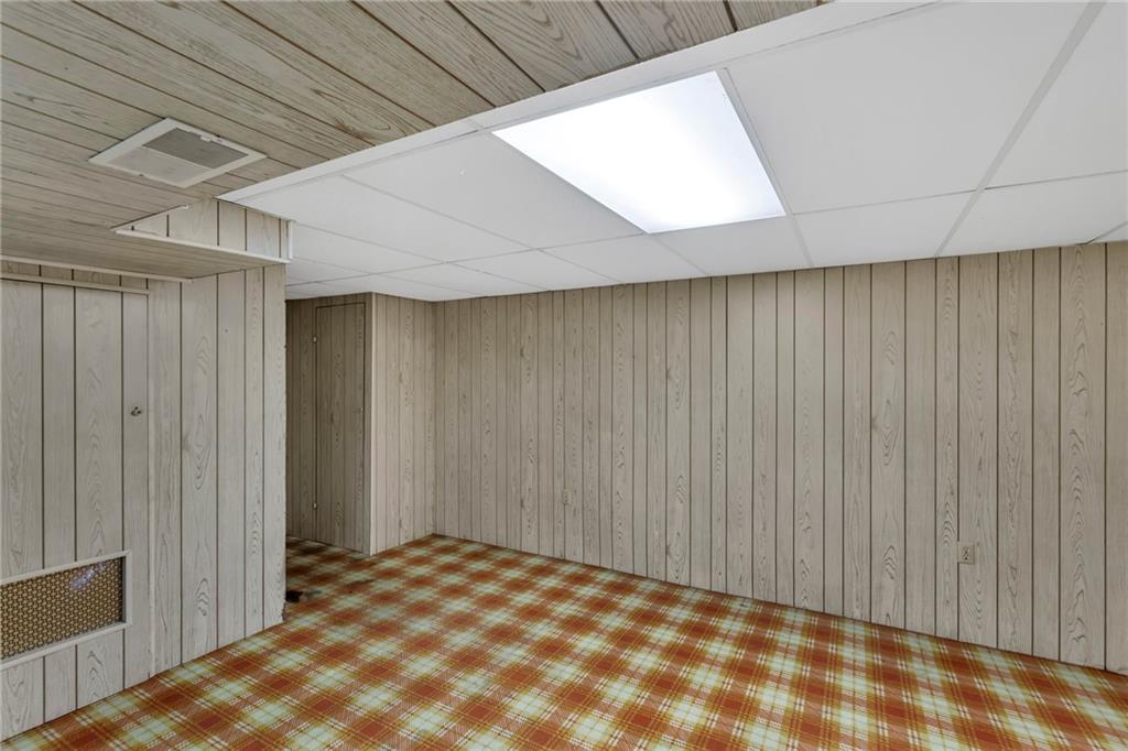 617 Blueberry Road Monroeville, PA 15146 - Photo 22 of 38 a view of a big room with wooden walls