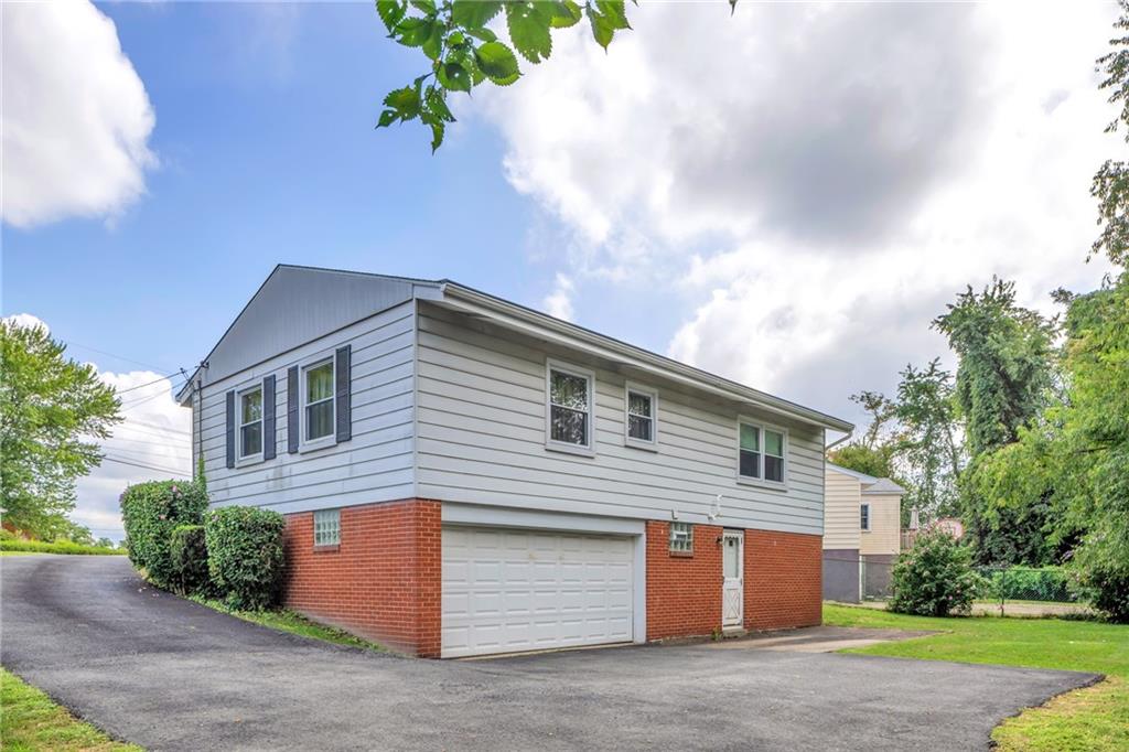 617 Blueberry Road Monroeville, PA 15146 - Photo 29 of 38 a front view of house with yard
