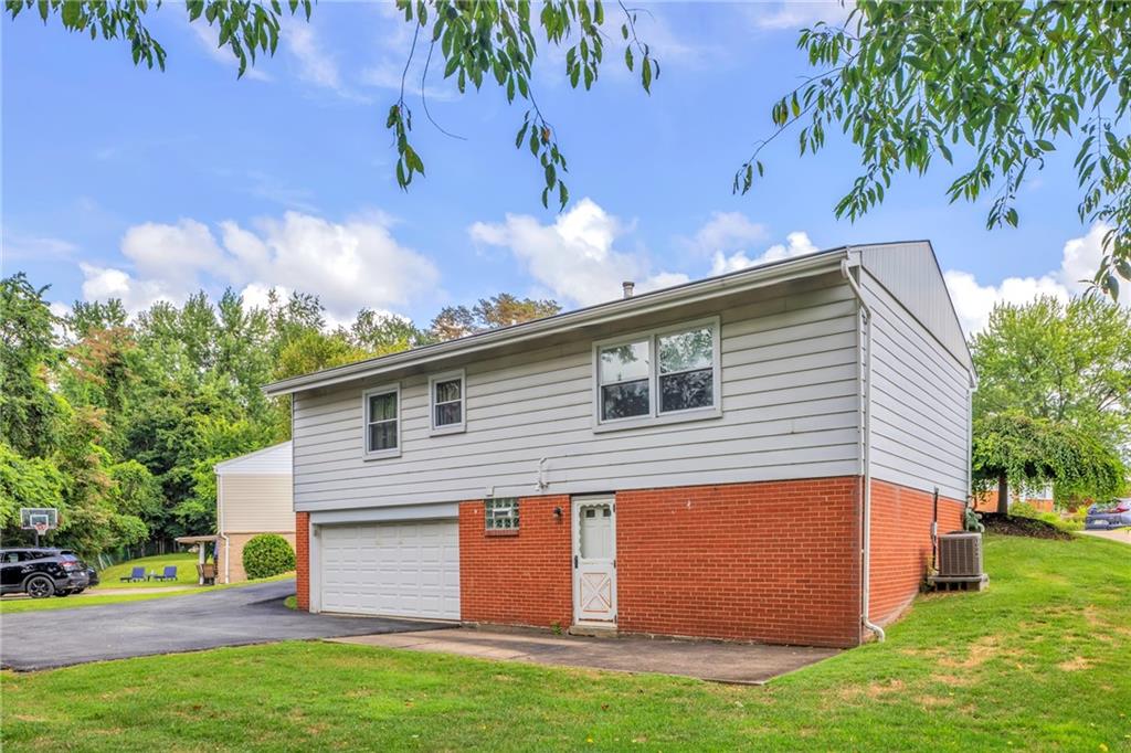 617 Blueberry Road Monroeville, PA 15146 - Photo 30 of 38 a view of backyard with a garden and deck
