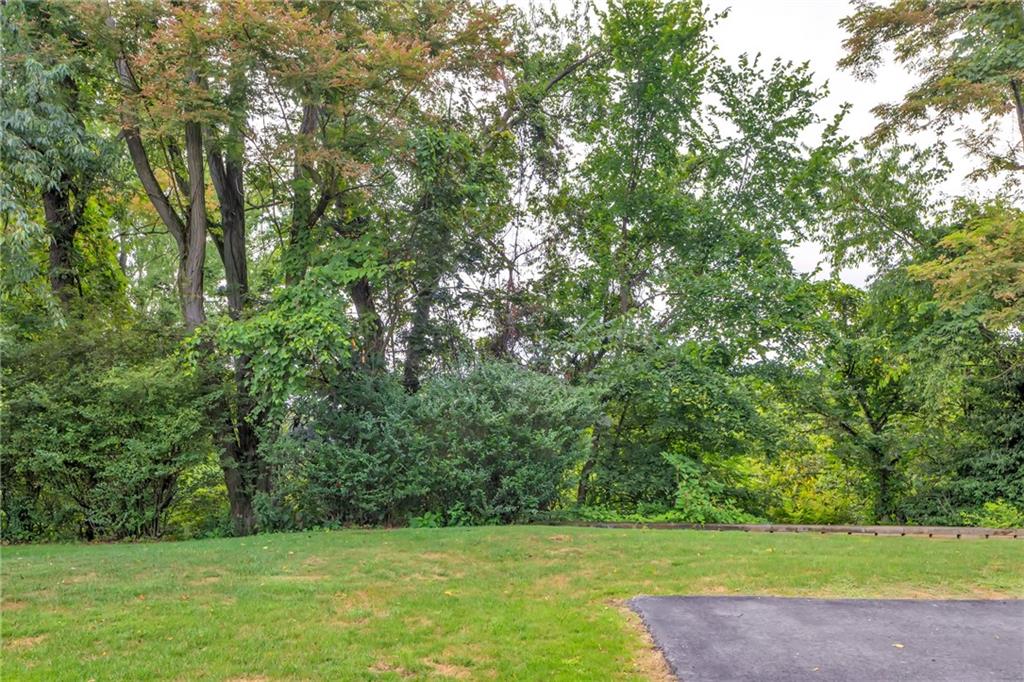 617 Blueberry Road Monroeville, PA 15146 - Photo 33 of 38 a view of a field with a trees in the background