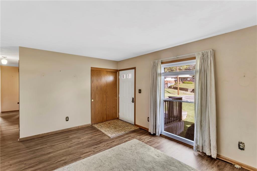 617 Blueberry Road Monroeville, PA 15146 - Photo 6 of 38 a view of a livingroom with wooden floor and closet