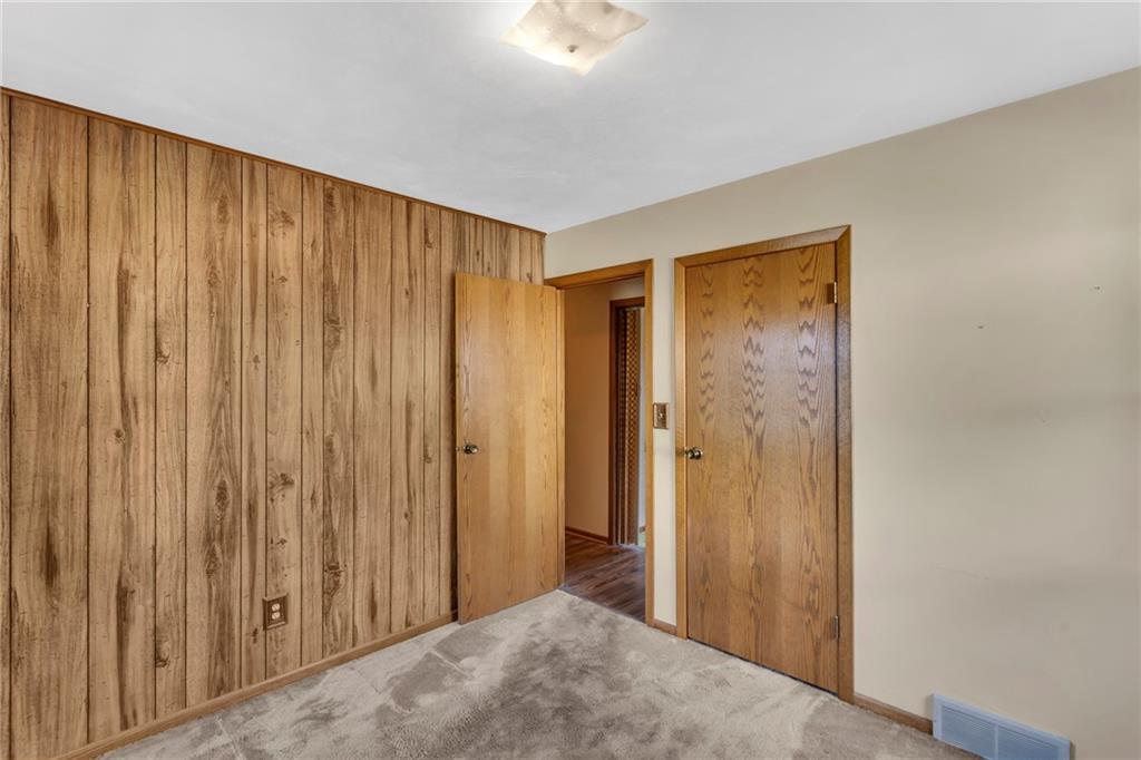 617 Blueberry Road Monroeville, PA 15146 - Photo 9 of 38 a view of a room with a wooden door