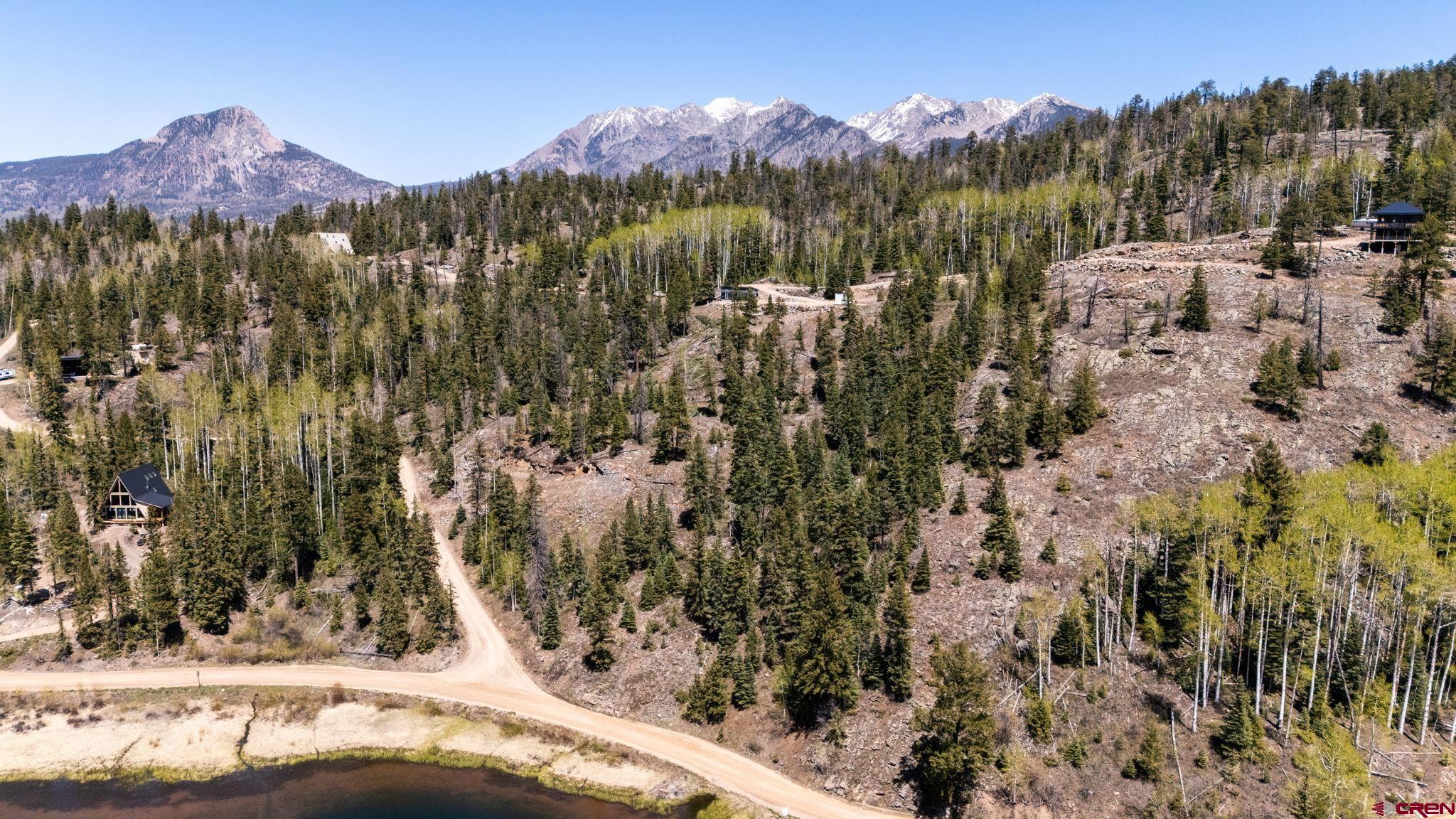 361 Deer Run Way Durango, CO 81301 - Photo 24 of 29 a view of a yard with a tree