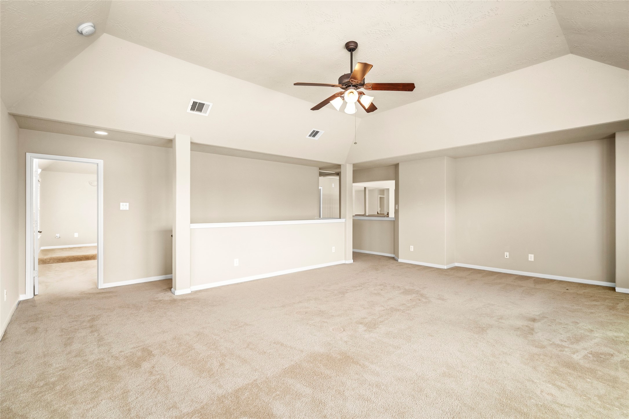 5307 Amber Sky Lane Rosharon, TX 77583 - Photo 33 of 50 Generously proportioned and full of natural light, this versatile game room offers limitless possibilities, from movie nights to a private play space.