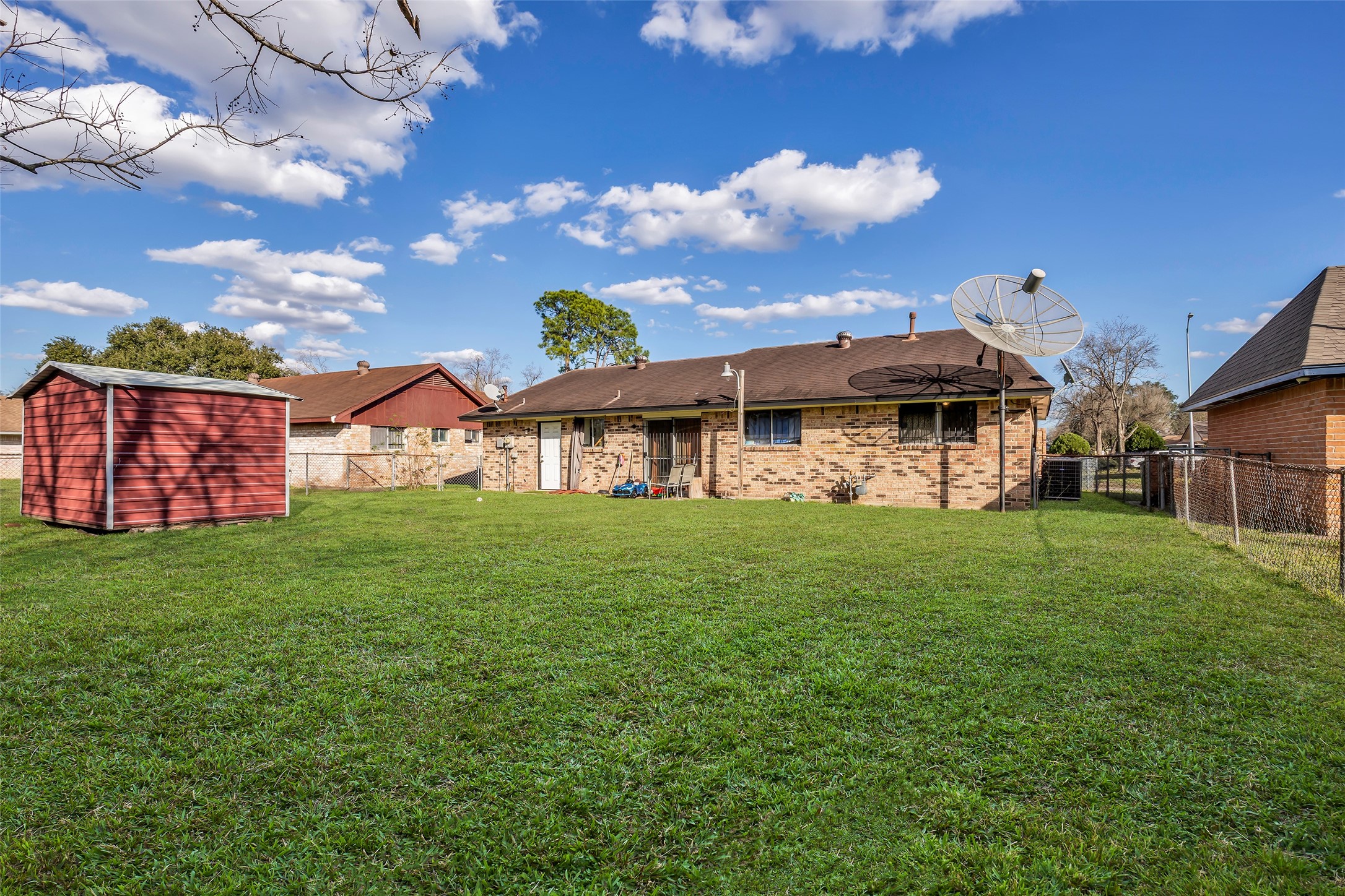 8823 Rutherford Lane Houston, TX 77088 - Photo 15 of 19 a front view of a house with a yard