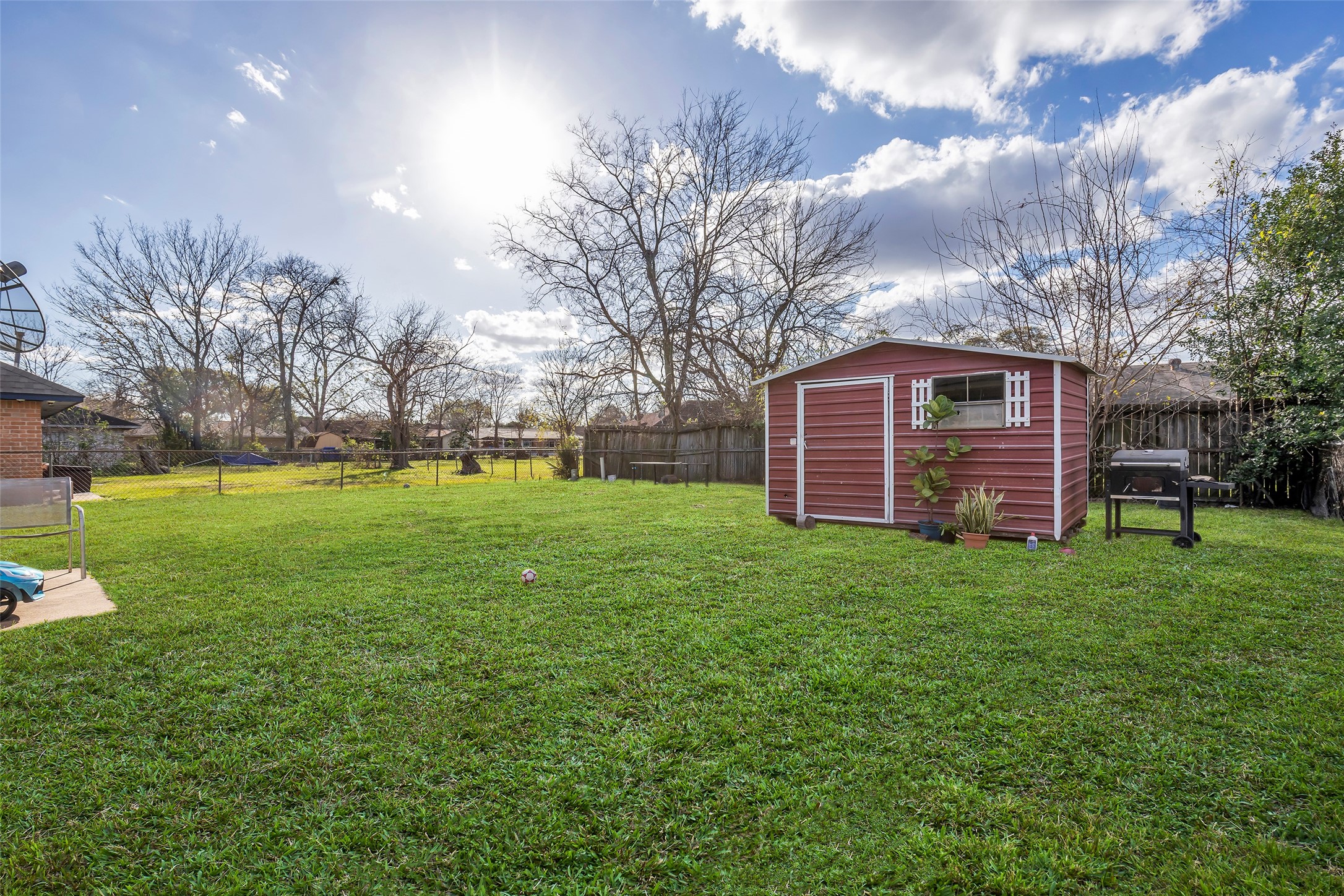 8823 Rutherford Lane Houston, TX 77088 - Photo 18 of 19 a view of a backyard with a garden