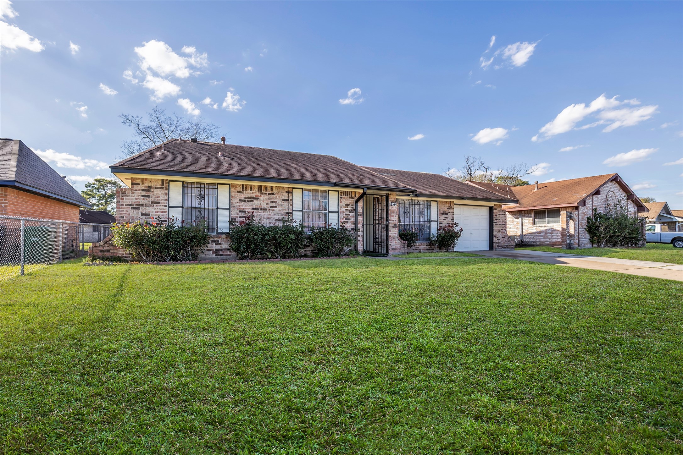 8823 Rutherford Lane Houston, TX 77088 - Photo 19 of 19 a view of a house with a backyard