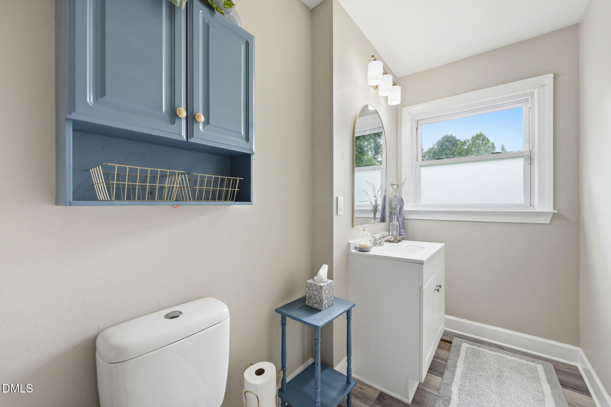 3200 Mill Creek Road Efland, NC 27243 - Photo 37 of 44 a bathroom with a toilet a sink and a window