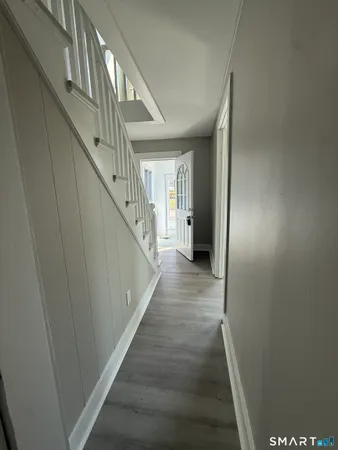 a view of hallway with stairs