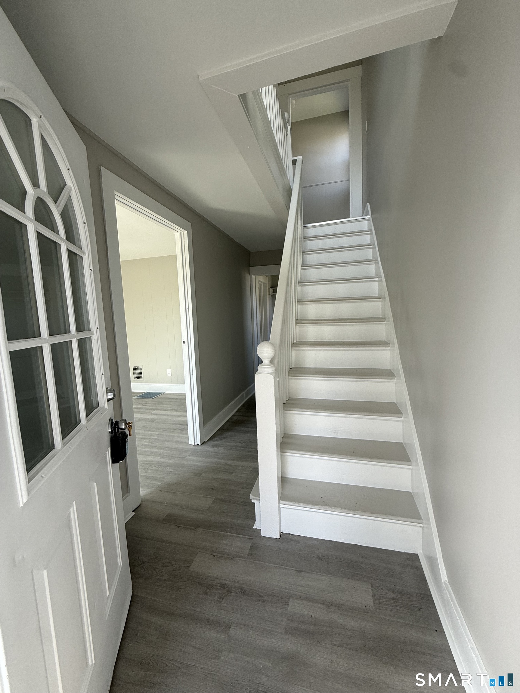 420 Short Beach Road East Haven, CT 06512 - Photo 2 of 23 a view of an entryway with wooden floor