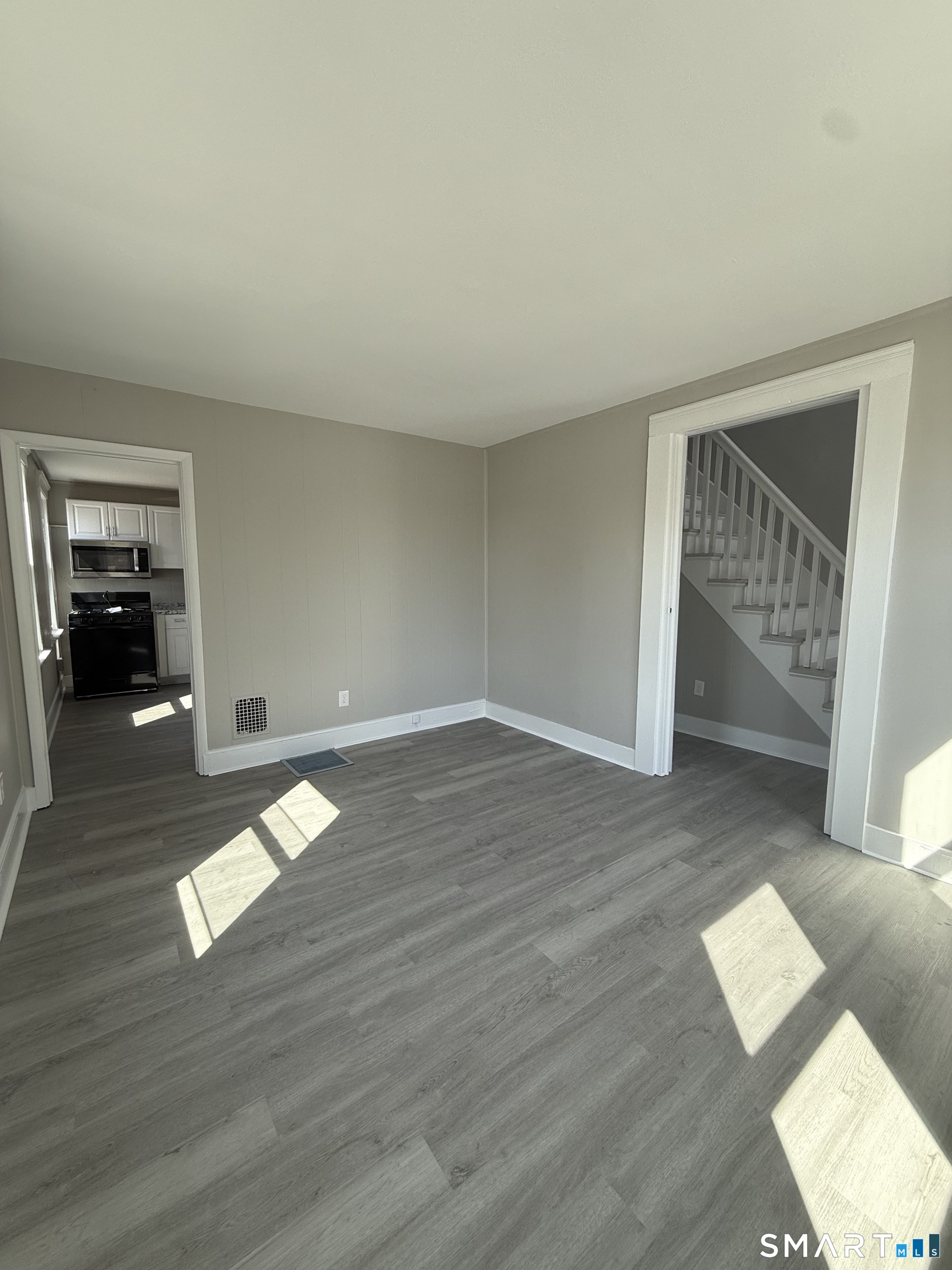 420 Short Beach Road East Haven, CT 06512 - Photo 3 of 23 wooden floor in an empty room