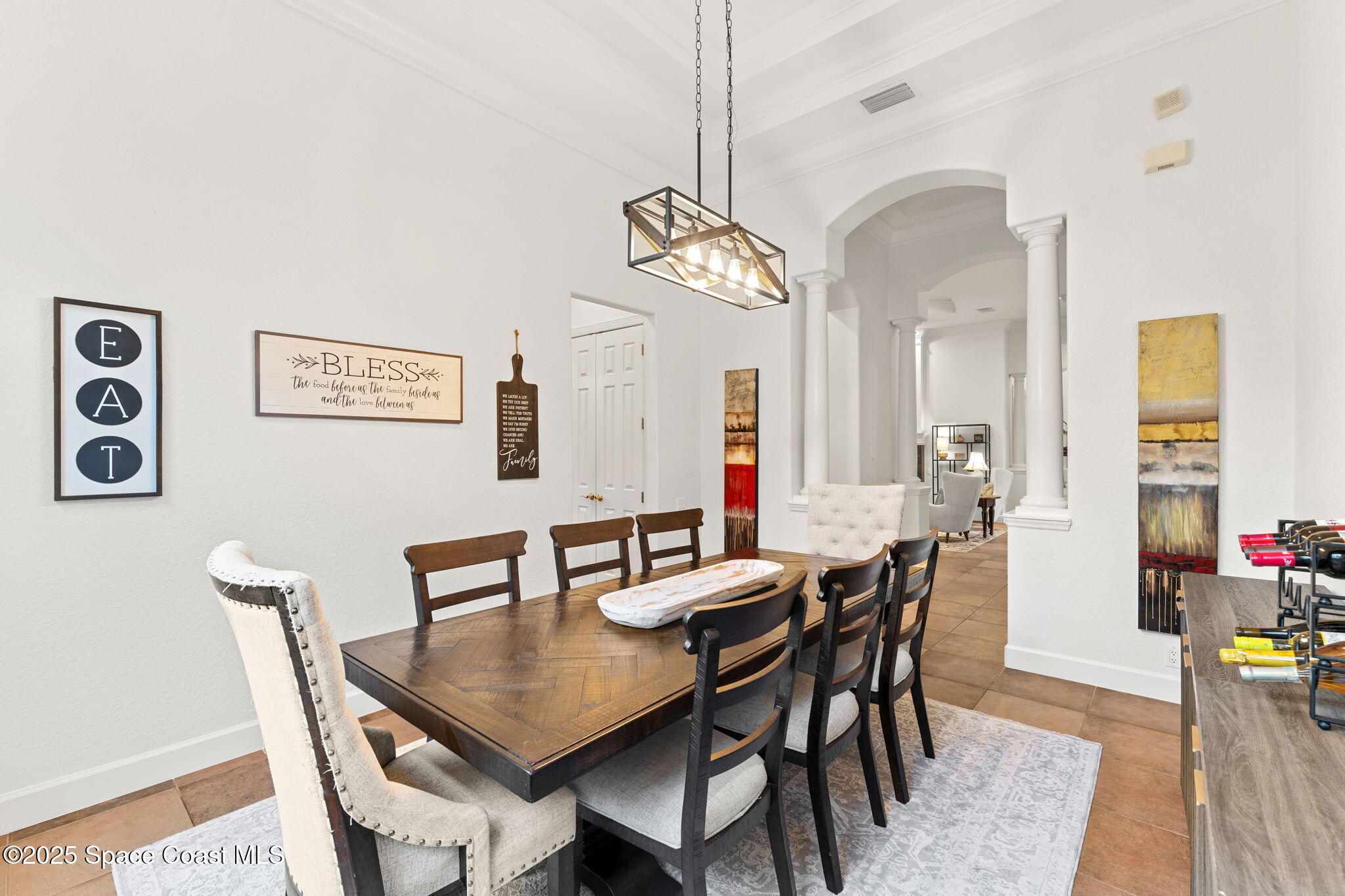 4447 Reseda Way Rockledge, FL 32955 - Photo 11 of 87 a view of a dining room with furniture and wooden floor