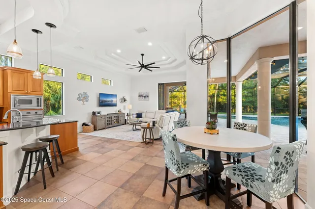 a living room with furniture or outdoor view and a large window