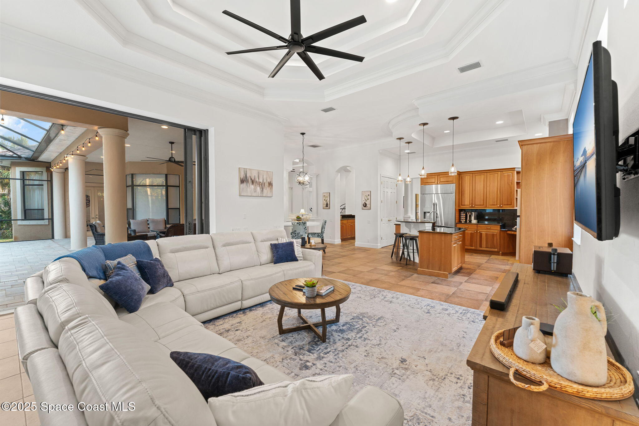 4447 Reseda Way Rockledge, FL 32955 - Photo 17 of 87 a living room with furniture or outdoor view and a large window