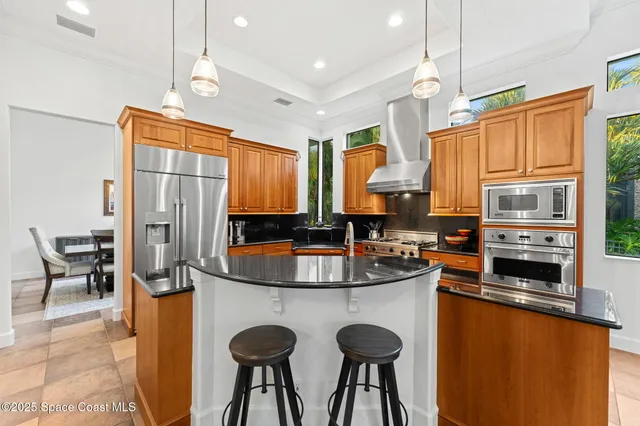 a bathroom with a sink double vanity and a mirror
