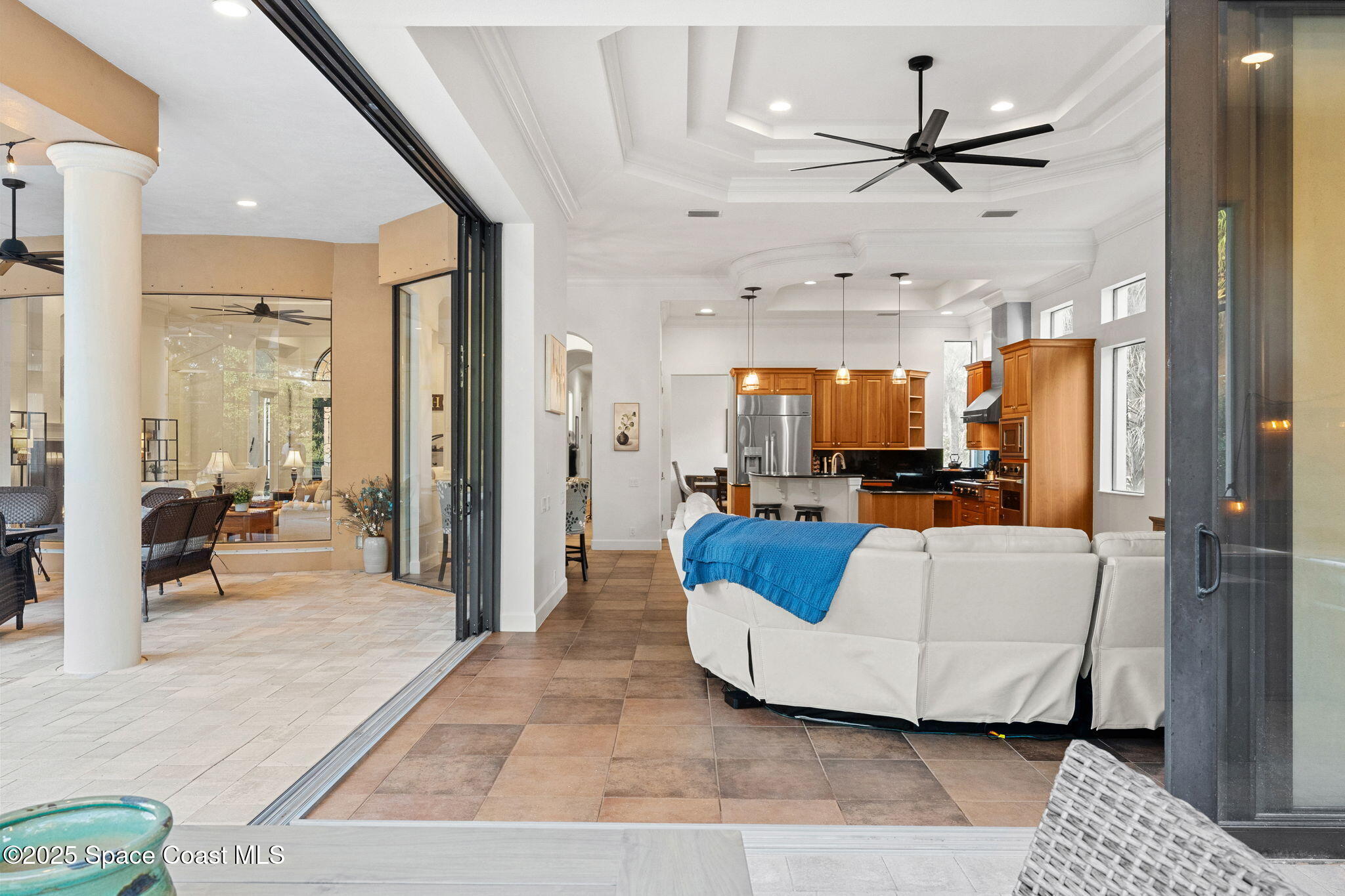 4447 Reseda Way Rockledge, FL 32955 - Photo 25 of 87 a living room with furniture and a large window