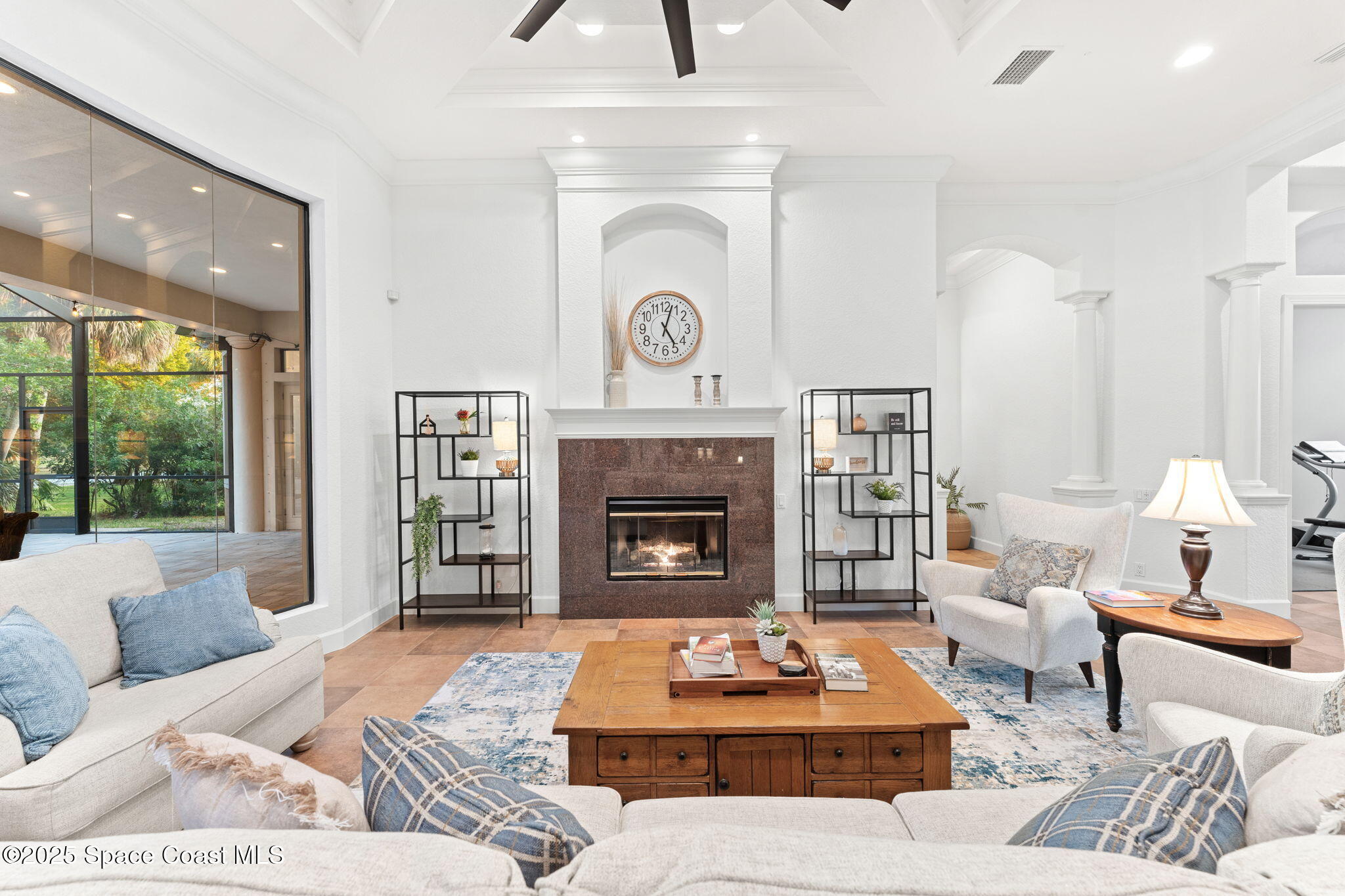 4447 Reseda Way Rockledge, FL 32955 - Photo 3 of 87 a living room with furniture and a fireplace