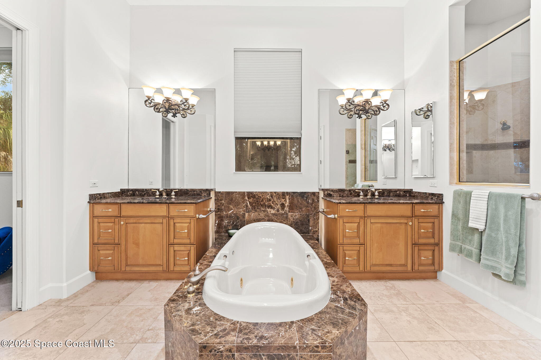 4447 Reseda Way Rockledge, FL 32955 - Photo 33 of 87 a bathroom with a sink double vanity and a mirror