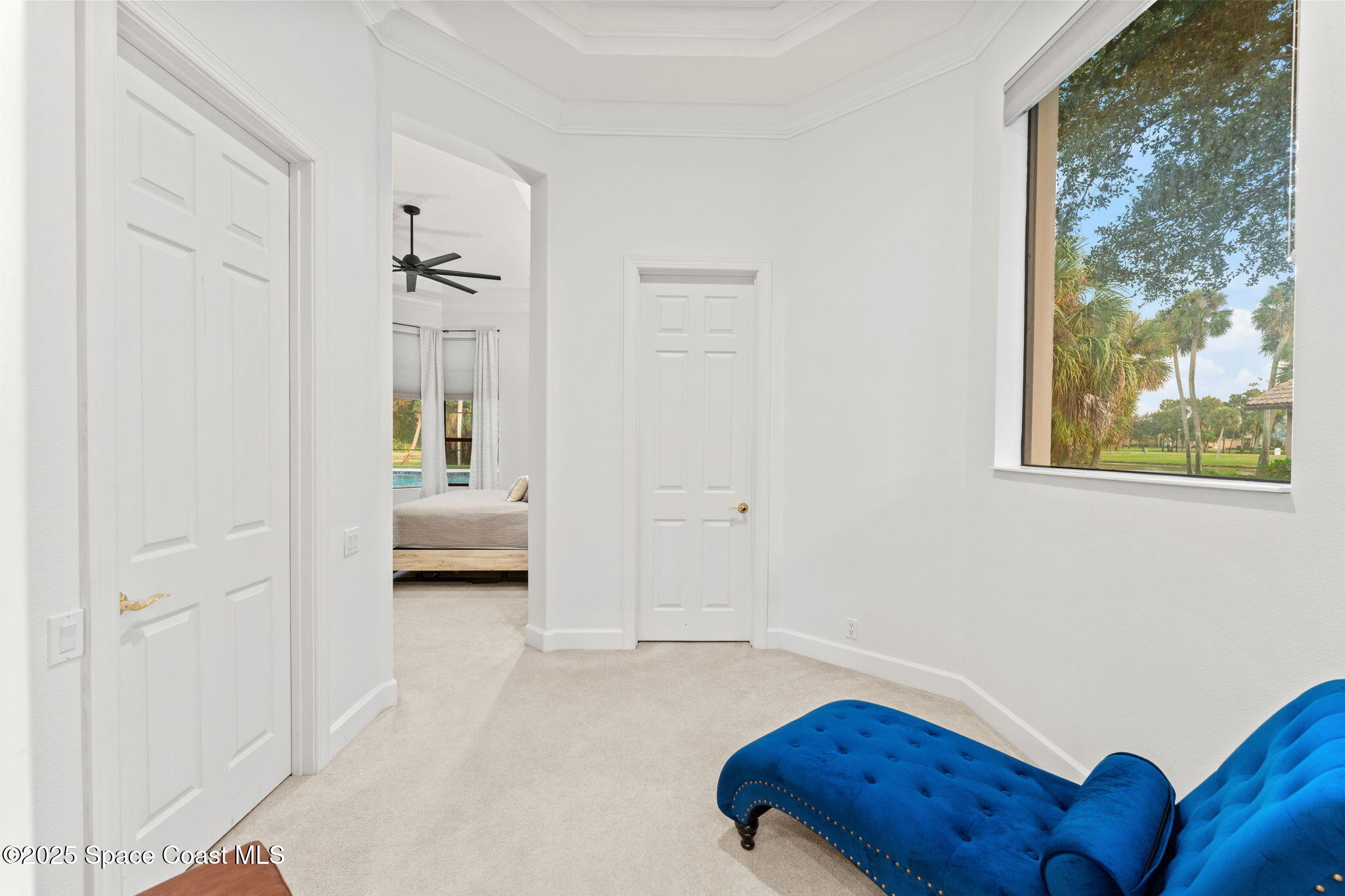 4447 Reseda Way Rockledge, FL 32955 - Photo 36 of 87 a living room with furniture and a gate